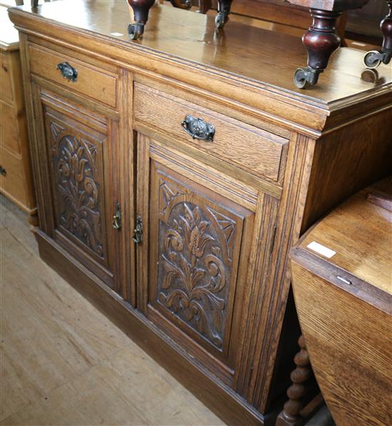 Late Victorian carved oak sideboard